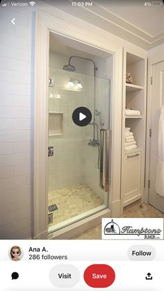 a walk in shower sitting inside of a bathroom