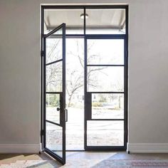 gloryirondoors steel frame glass double door with transom Wrought Iron Front Door, French Front Doors, Steel Doors Exterior, Steel Frame Doors, Steel Doors And Windows, Iron Front Door, Steel Front Door, Iron Entry Doors, Steel Windows