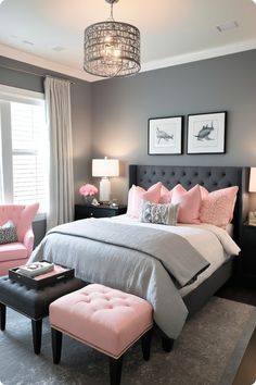 a bedroom with gray walls and pink accents