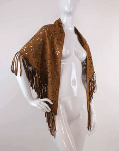 Elevate your style with our exquisite Faux Leather Fringe Scarf, designed to infuse a touch of Southwestern charm into any outfit. Crafted from premium-quality faux suede, this vintage-inspired scarf offers a luxurious feel and an effortlessly chic look. The intricate fringe detailing adds a playful yet sophisticated edge, making it the perfect accessory for both casual and formal ensembles. Whether you're looking to complement a bohemian wardrobe or add a vintage twist to modern attire, this scarf is versatile enough to meet all your fashion needs. The rich texture and classic design ensure that it remains a timeless piece in your collection. ### Shipping Information: - **Ready to Ship Within 2 days - **Fast Shipping Available upon request - **Gift Wrapping Available - **Note Color may va Bohemian Wardrobe, Western Scarf, Fringe Scarf, Leather Fringe, Timeless Pieces, Faux Suede, Classic Design, Scarf Accessory, Vintage Inspired