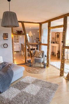 a living room filled with furniture and lights