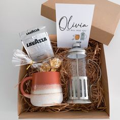 an open box containing coffee and other items