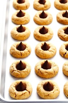 chocolate chip cookies on a baking sheet ready for the oven to be baked into them