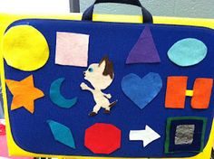 a child's suitcase with felt shapes on it