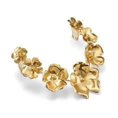 a gold bracelet with flowers on it