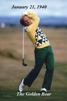 a man swinging a golf club on top of a green field