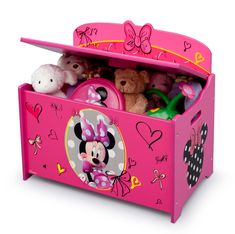 a pink toy box filled with lots of stuffed animals