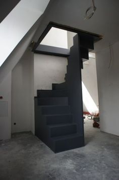 an empty room with some stairs in it