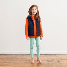 the lightweight puffer vest Sleeveless Puffer Jacket For Fall, Sporty Sleeveless Puffer Vest, Casual Nylon Tank Top, Sporty Sleeveless Puffer Outerwear, Cotton Puffer Vest, Puffer Vests, All Kids, Puffer Vest, A Rainbow