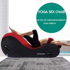 a woman is laying on a yoga chair