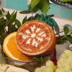 oranges and other fruits are on a table