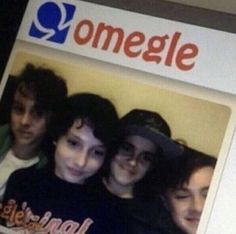 a computer screen with an image of some people on it and the words omegle above them