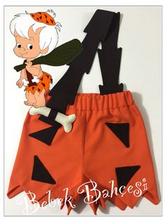 an orange and black costume for a child's halloween outfit with the letter m on it