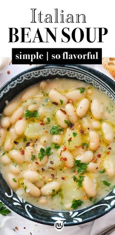 a bowl filled with bean soup and garnished with parsley on the side