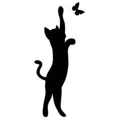 a black and white silhouette of a cat catching a butterfly