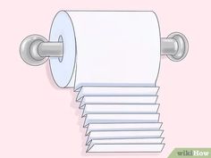 a roll of toilet paper sitting on top of a pink wall