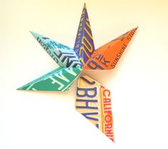 an origami star with the words happy birthday written on it in different colors