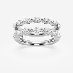 two white gold wedding bands with round diamonds