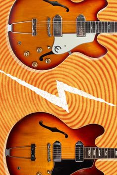 two guitars are shown side by side on an orange and yellow background with white lines