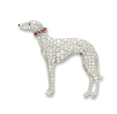 a diamond and ruby dog brooch