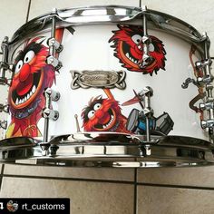 a drum with the muppets on it