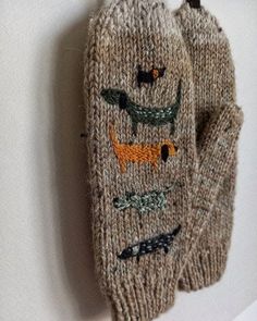 an oven mitt hanging on the wall