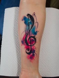 a person with a colorful tattoo on their arm