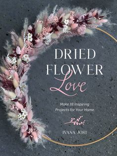 the cover of dried flower love, with pink and white flowers arranged in a circle