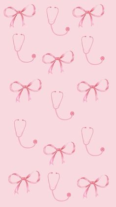 a pink background with many different types of hair clips