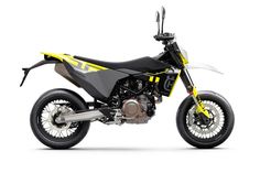 a white and yellow dirt bike on a white background