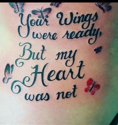 a woman's stomach with words written on it that says, your wings were ready but my heart was not