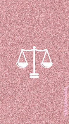 the scales of justice on pink glitter paper