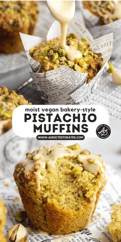 a muffin is being drizzled with white icing and has pistachio toppings