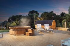 a hot tub sitting on top of a wooden deck next to a white lawn chair