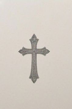 the cross is drawn in silver on white paper