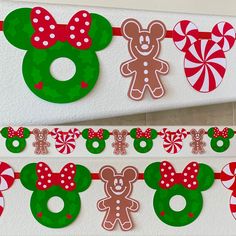 mickey and minnie mouse christmas garlands with candy canes on the bottom one is red, white and green