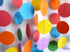 colorful paper circles hanging from the ceiling