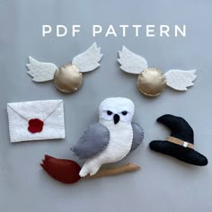 an owl, witch hat, and other felt crafting items on a gray background