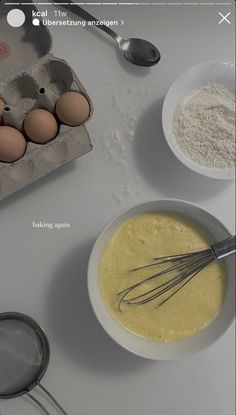 an image of eggs and flour in bowls