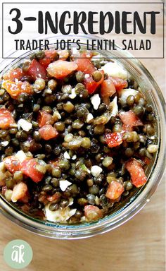 a glass bowl filled with lentils and tomatoes on top of a wooden table text reads 3 - ingredient trader joe's lentil salad