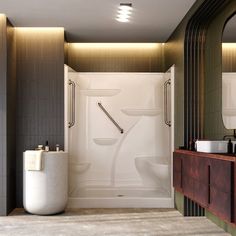 a bathroom with a sink, mirror and shower in it's center wall is lit by recessed lights