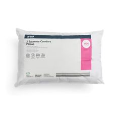 two supreme comfort pillows in white and pink on a white background with the words, 2 supreme comfort pillows