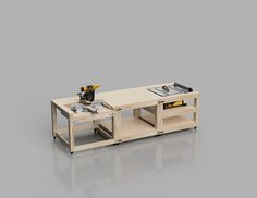 a workbench with a table and tools on it