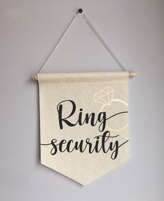 a ring security banner hanging on the wall