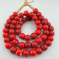 55 beads 23" of beads 58cm 25" strand with raffia 12mm diameter 2mm hole Artisan Red Spacer Beads, Red Wooden Beaded Necklaces, Red Wooden Beaded Necklace, Wooden Beads For Jewelry Making, Artisan Round Spacer Beads, Wooden Round Beads For Jewelry Making, Round Wooden Beads For Jewelry Making, Round Beaded Necklaces With Large Beads For Beach, Traditional Wooden Beads For Beach