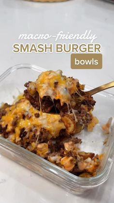 a close up of food in a container on a table with the words, macaro - friendly smash burger bowls