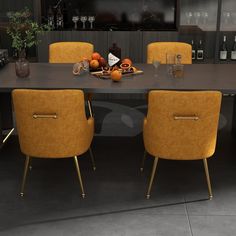 an image of a dining room setting with oranges and wine glasses on the table