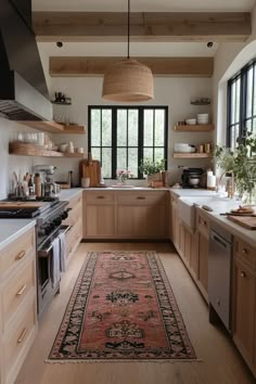 a large rug in the middle of a kitchen