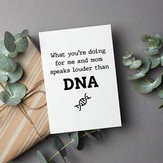 a card that says what you're doing for me and mom speaks louder than dna