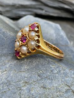 Outstanding 18ct antique ruby and pearl Navette ring.  This beautiful old ring is crafted in a rich buttery 18ct gold and wet with creamy natural pearls and vibrant rubies.  A real beauty some light wear commensurate with age but in very good condition for age.  UK Size L Pearl And Ruby Ring, Victorian Gold Ring With Ruby, Victorian Pearl Ring With Gemstone For Gift, Ruby And Pearl Ring, Victorian Ruby Ring In 14k Gold, Victorian Gold Pearl Ring With Gemstone, Navette Ring, Baroque Necklace, Ruby And Pearl